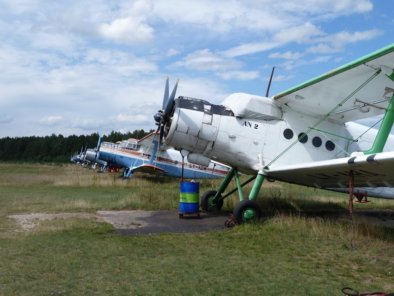 A row of Antonov 2 mostly static but one was used by the on-site parashute club for their jumps