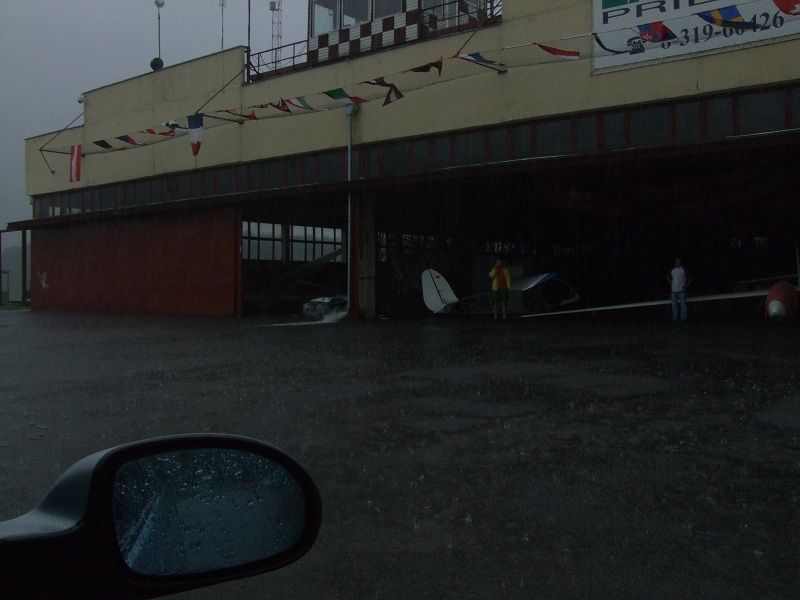 Rain storm gushing fom the hangar